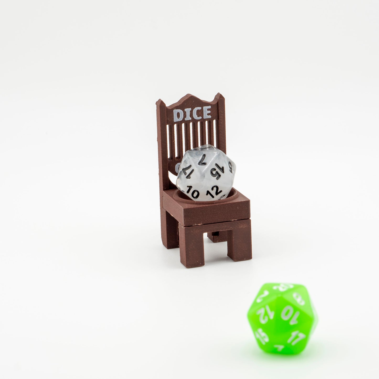 A brow dice cuck chair with a d20 in it